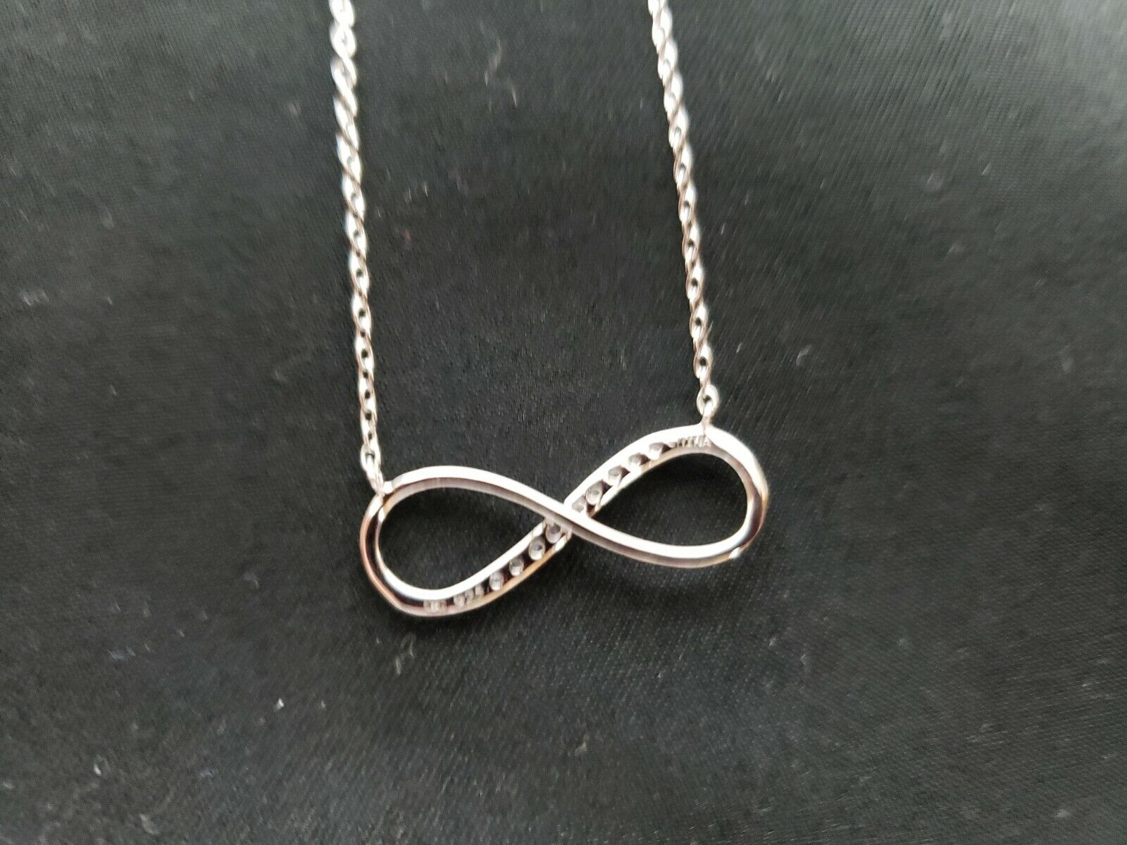 Sterling Silver Rhodium-Plated w/ CZ Infinity with 2 IN EXT Necklace