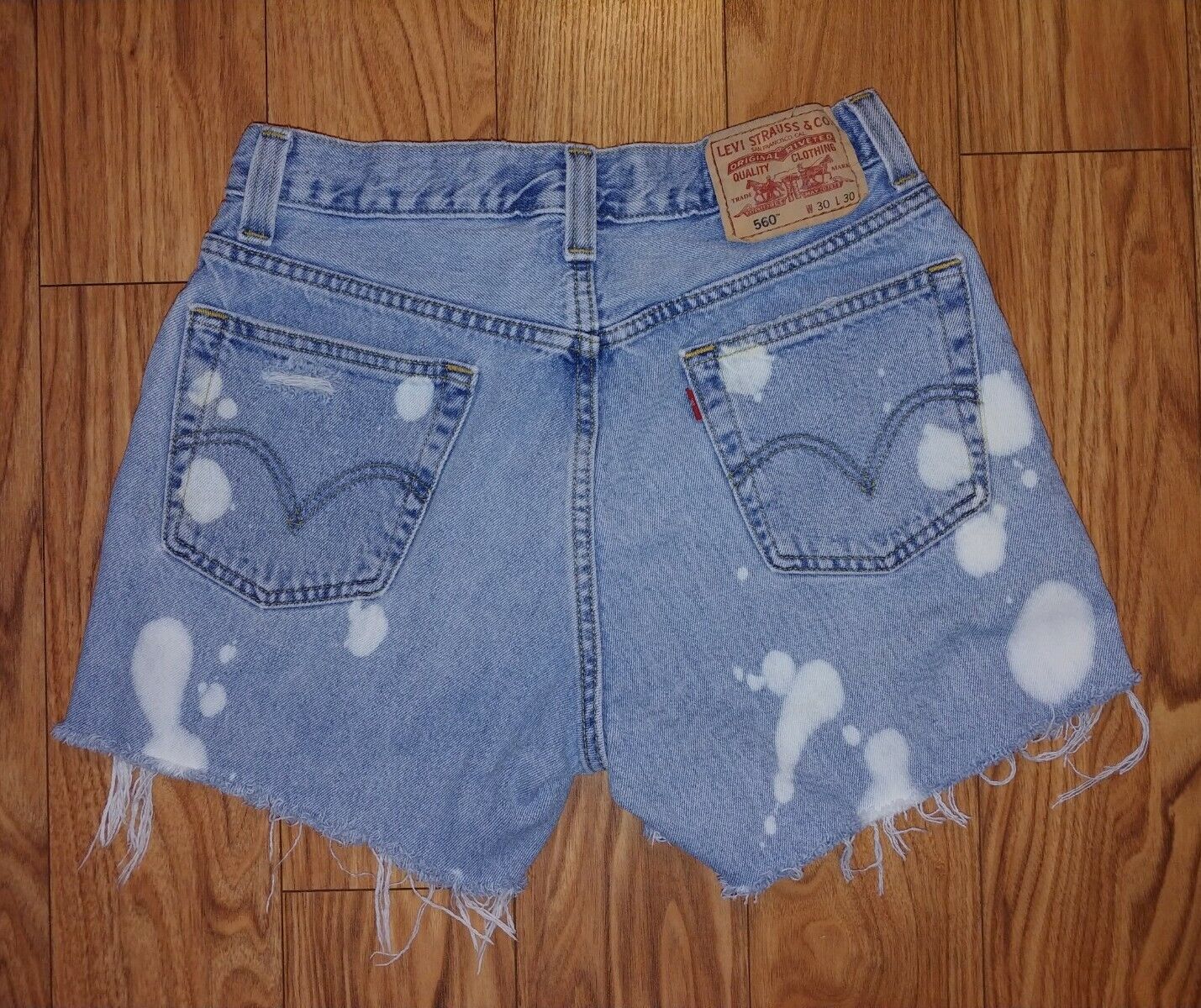 VINTAGE 90s Levis Women's Preloved Distressed Cut Off 560 Comfort Fit High Rise Shorts Size 30