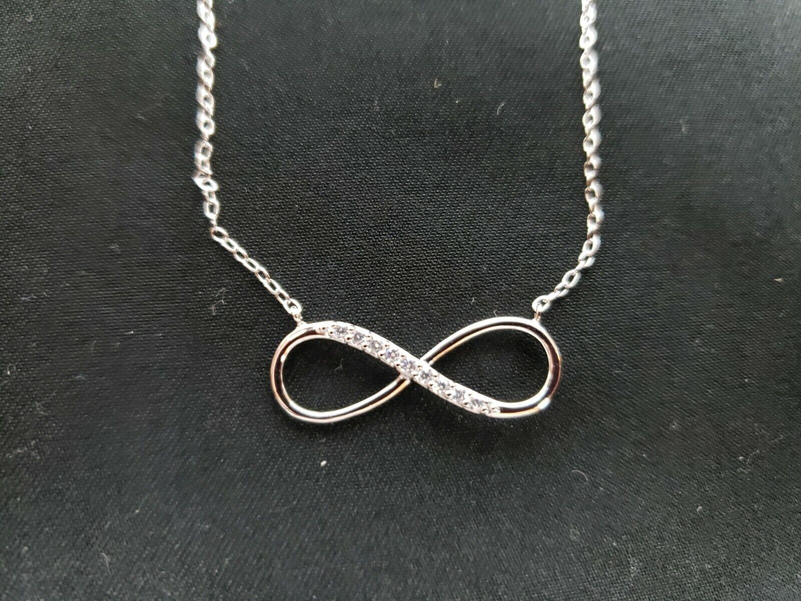 Sterling Silver Rhodium-Plated w/ CZ Infinity with 2 IN EXT Necklace