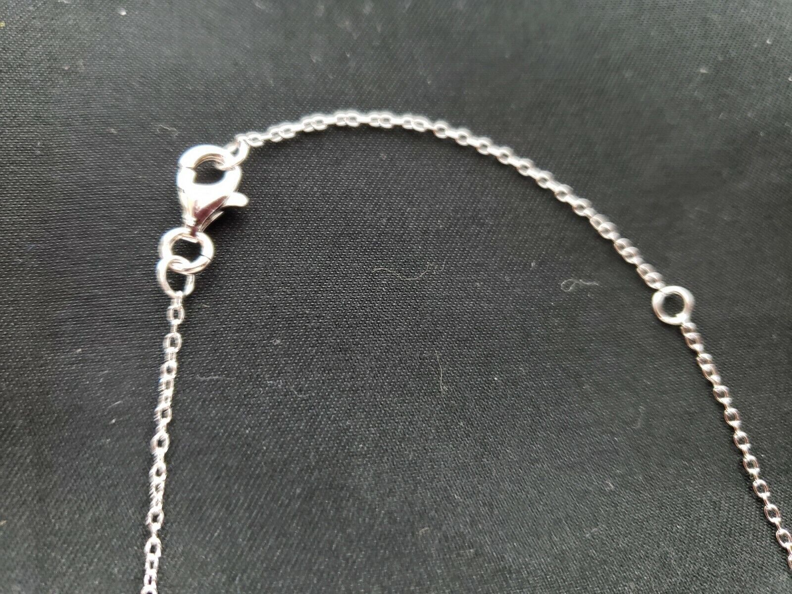 Sterling Silver Rhodium-Plated w/ CZ Infinity with 2 IN EXT Necklace