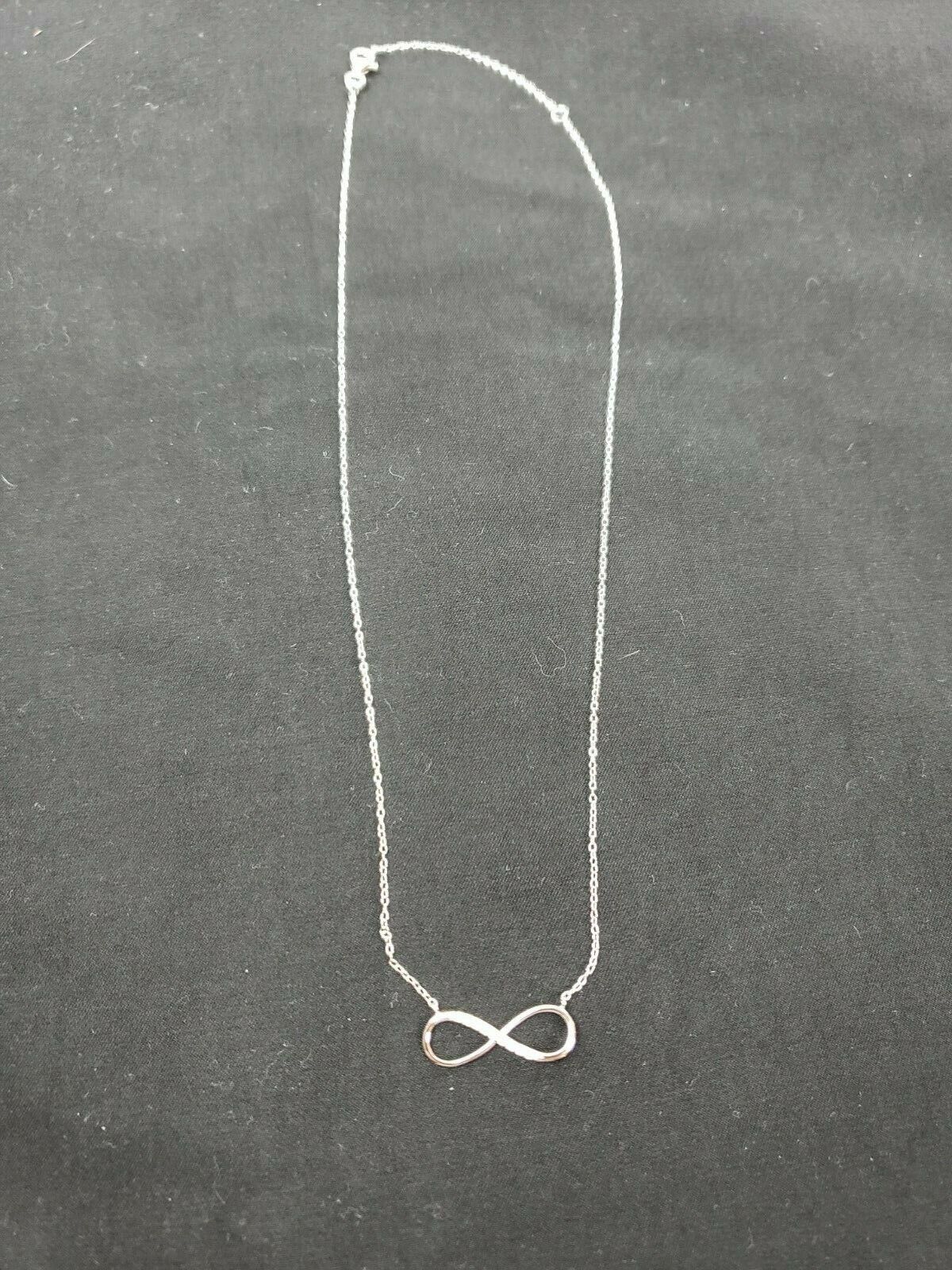 Sterling Silver Rhodium-Plated w/ CZ Infinity with 2 IN EXT Necklace