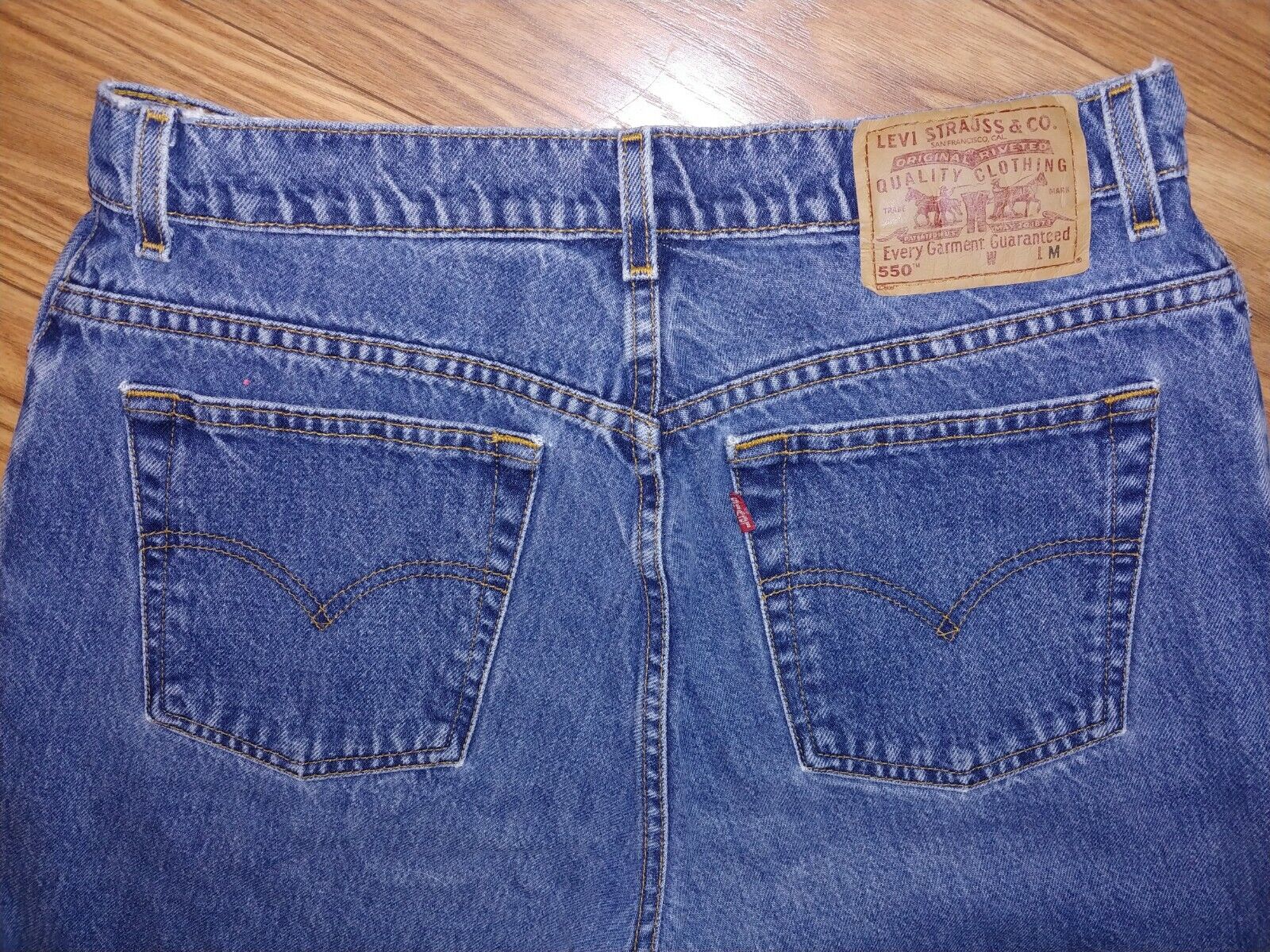 VINTAGE Preloved Levi's 550 High Rise Relaxed Fit Tapered Leg Denim Size 14M