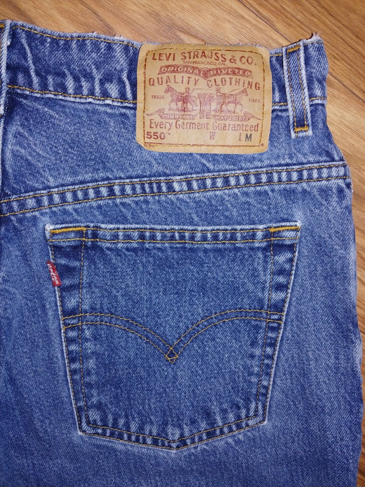 VINTAGE Preloved Levi's 550 High Rise Relaxed Fit Tapered Leg Denim Size 14M